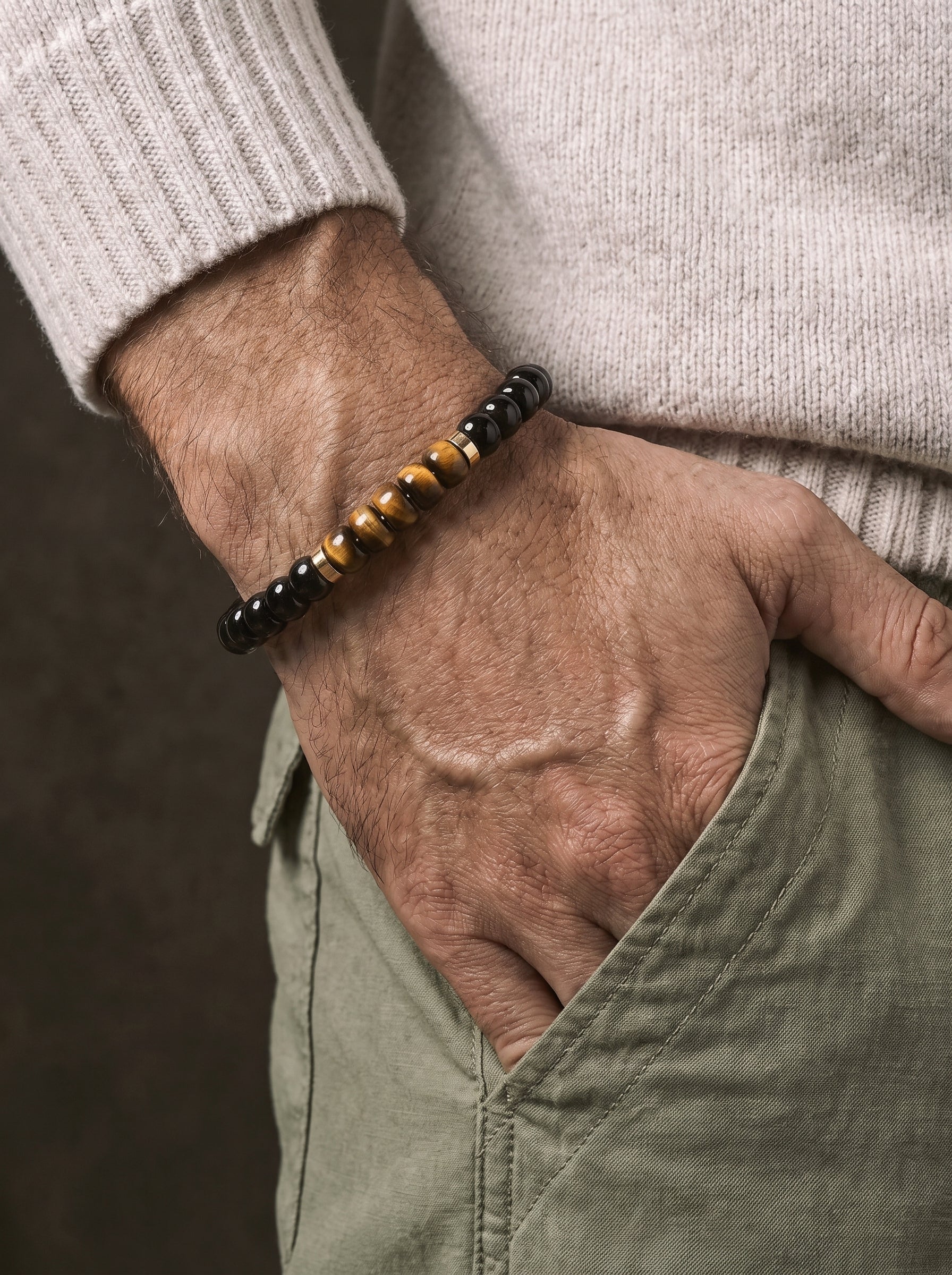 Obsidian Tiger Eye Tablet Bracelet worn on wrist