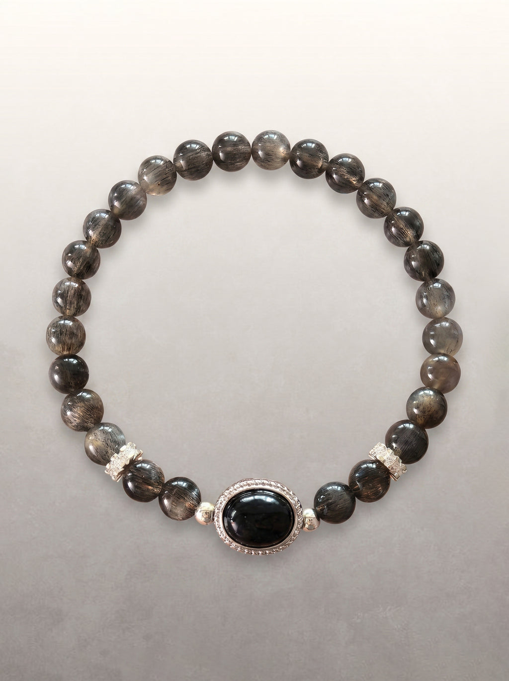 Black Skeletal Quartz Statement Bracelet with a black oval focal stone