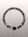 Black Skeletal Quartz Statement Bracelet with a black oval focal stone