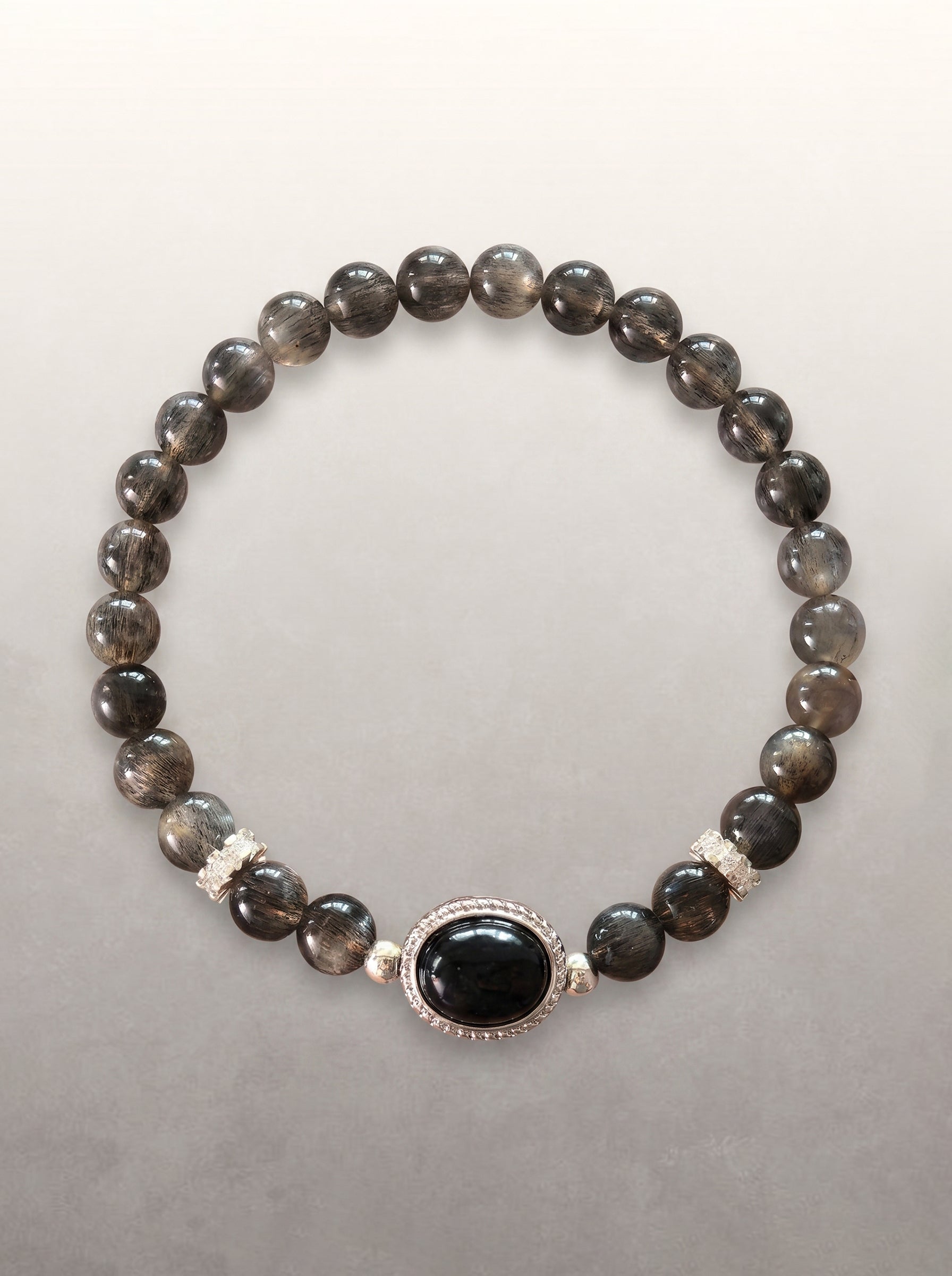 Black Skeletal Quartz Statement Bracelet with a black oval focal stone