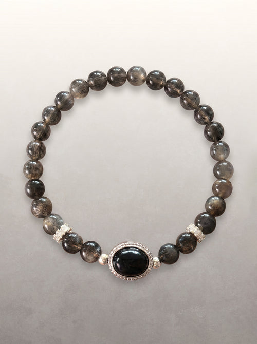 Black Skeletal Quartz Statement Bracelet with a black oval focal stone