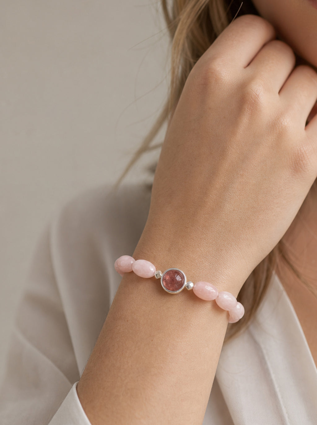 Pink Morganite Strawberry Quartz Seed Bead Bracelet worn on wrist