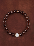 Garnet Moonstone Accent Bracelet with a pale focal bead