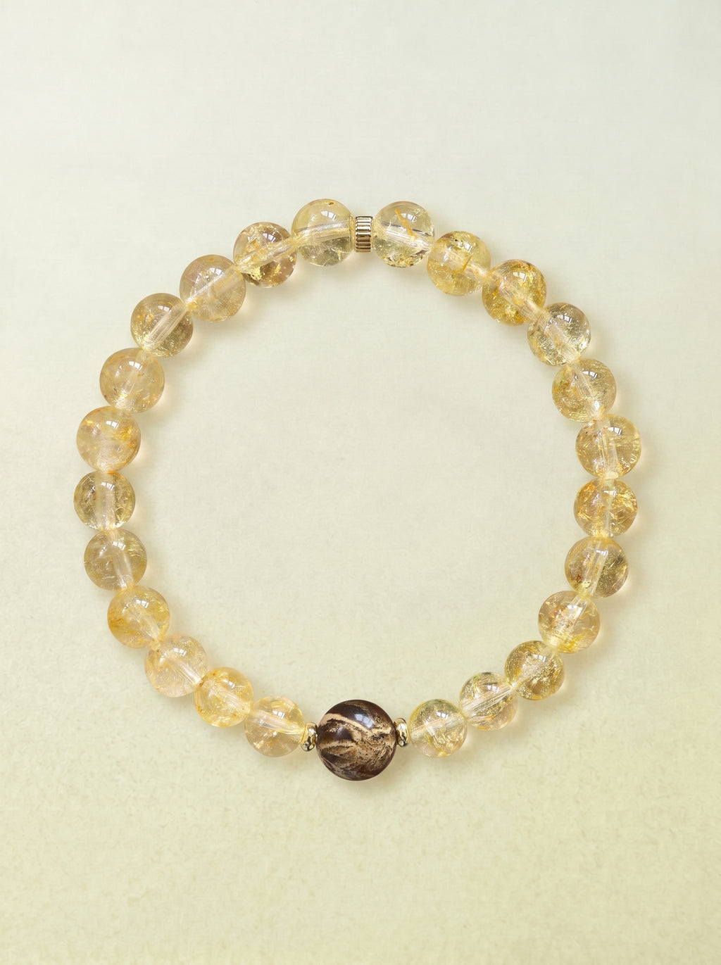 Citrine Amber Accent Bracelet with a darker focal bead