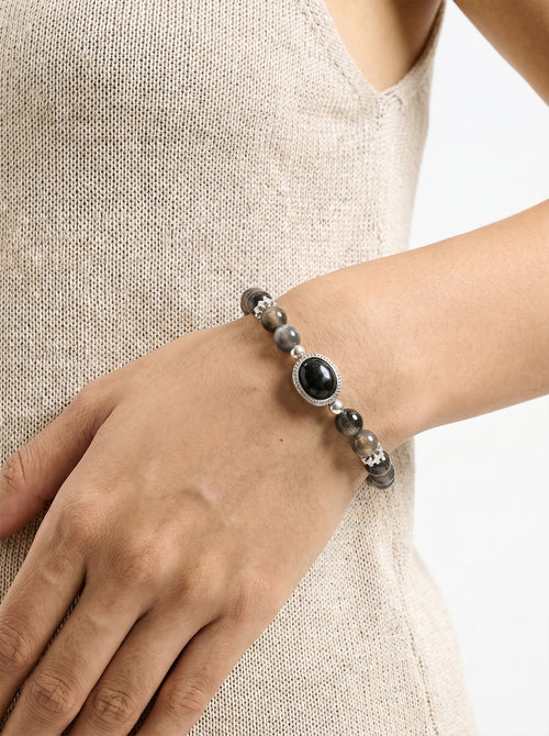 Black Skeletal Quartz Statement Bracelet worn on wrist